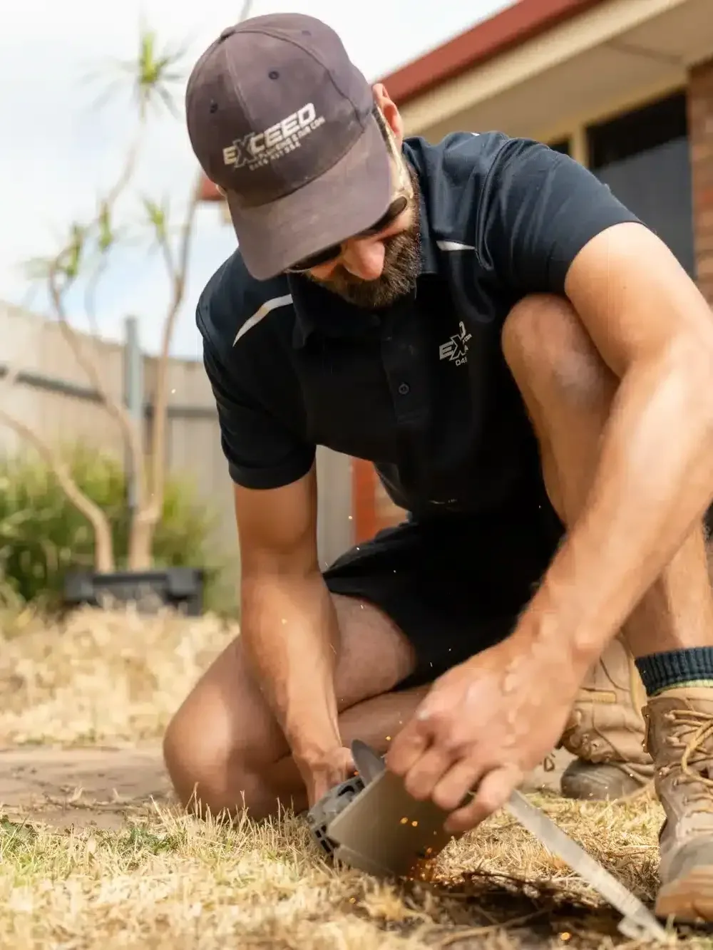 A Happy Valley plumber at work on a job